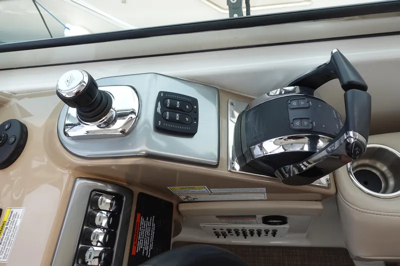  Yacht Photos Pics Control panel of a 2016 Formula 34 Cruiser boat with joystick and throttle.