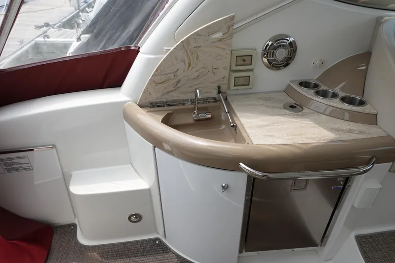  Yacht Photos Pics 2016 Formula 34 Cruiser yacht interior with sink, countertop, and cup holders.