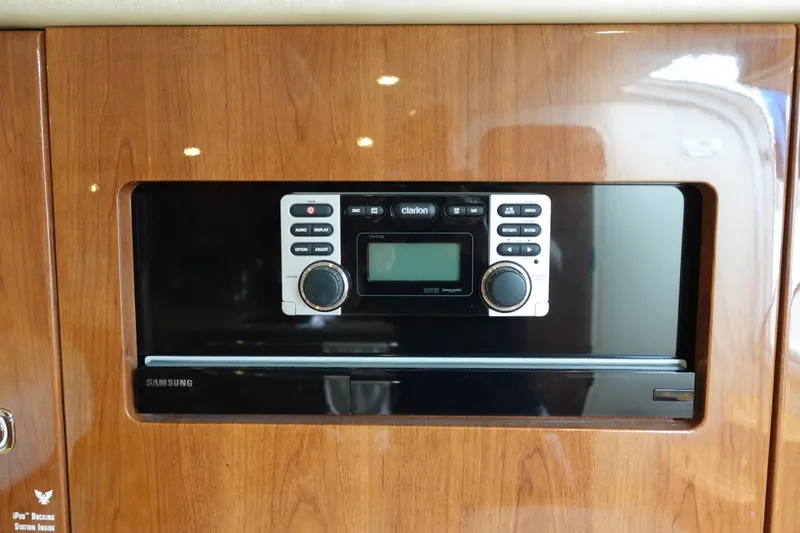  Yacht Photos Pics Built-in stereo system on 2016 Formula 34 Cruiser with wood paneling.