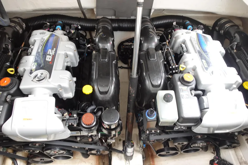 Yacht Photos Pics Twin engines in a 2016 Formula 34 Cruiser boat, showcasing powerful marine engineering.