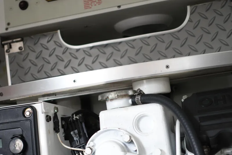  Yacht Photos Pics Engine compartment of a 2016 Formula 34 Cruiser with diamond plate detailing.