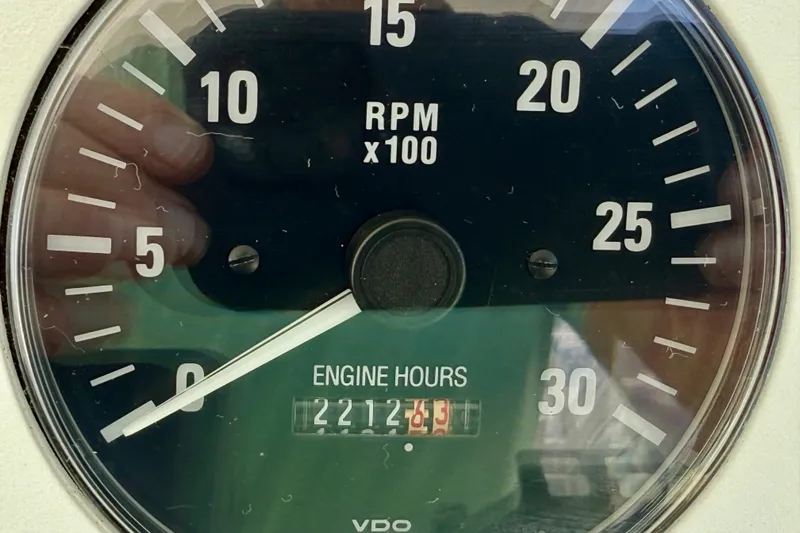  Yacht Photos Pics Close-up of a 2001 Cabo 35 Express tachometer showing 2212.3 engine hours.