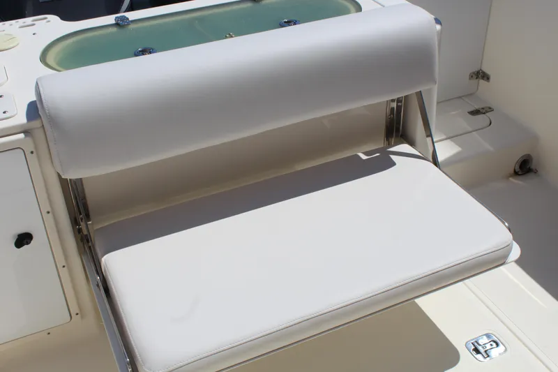  Yacht Photos Pics 2008 Pursuit S 310 Sport boat with cushioned seating and livewell.