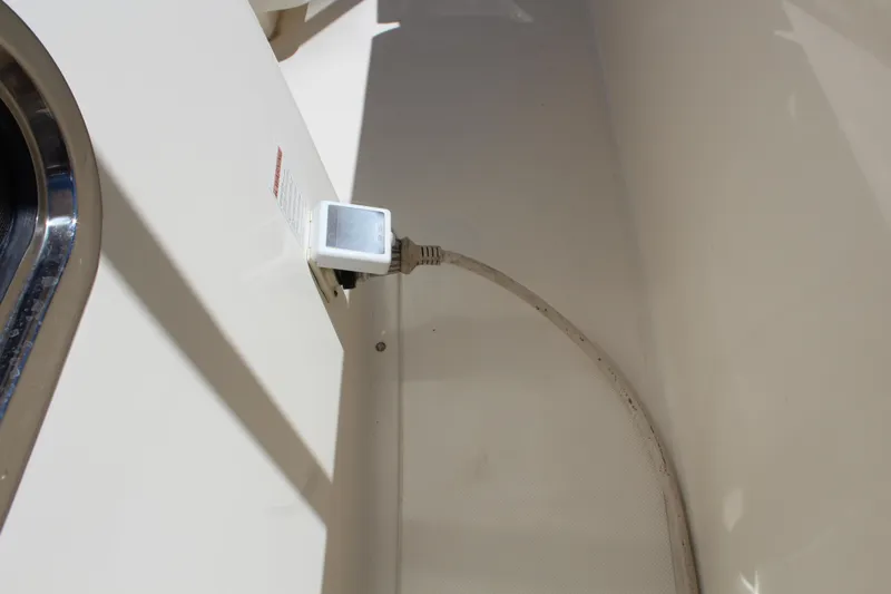  Yacht Photos Pics 2008 Pursuit S 310 Sport boat interior with cable connection.