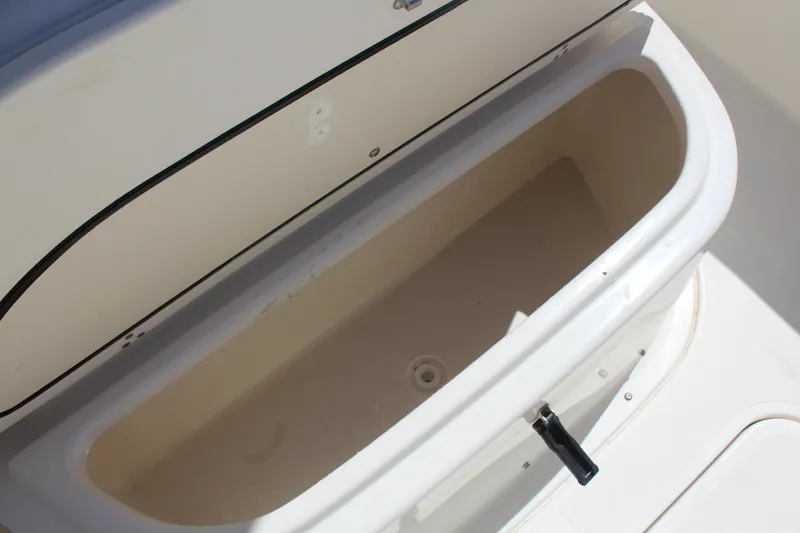  Yacht Photos Pics Open storage compartment on a 2008 Pursuit S 310 Sport boat.