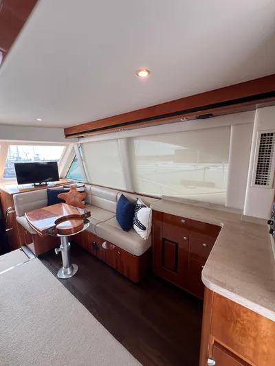 No Name Yacht Photos Pics Luxurious interior of 2016 Riviera 45 OPEN yacht with elegant seating and modern amenities.