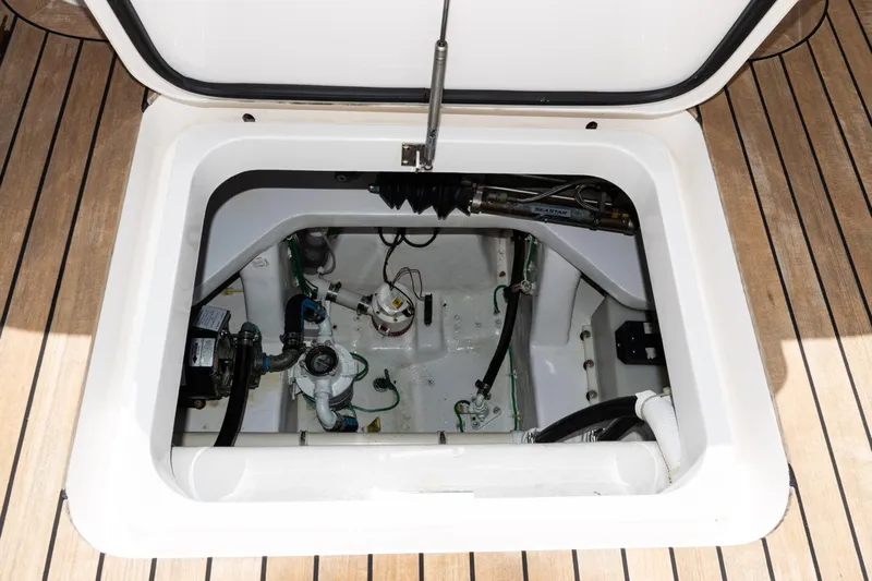  Yacht Photos Pics Engine compartment of 2021 Viking 44 Open yacht, showcasing mechanical components and clean design.