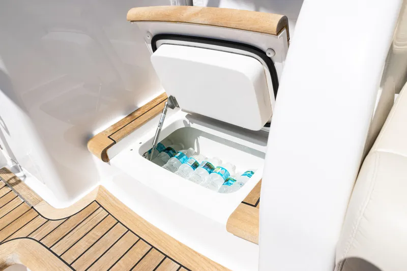  Yacht Photos Pics Built-in cooler with bottled water on 2021 Viking 44 Open yacht deck.