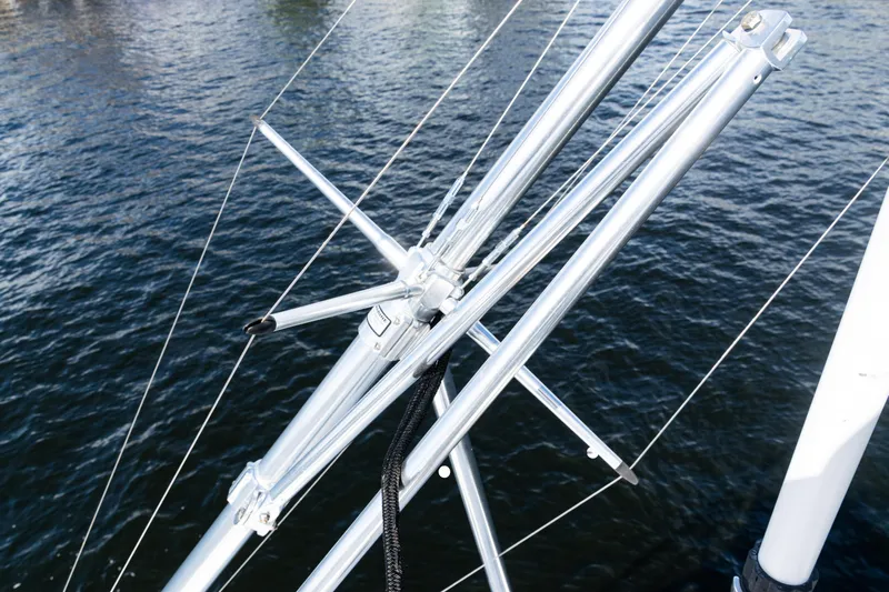  Yacht Photos Pics Close-up of 2021 Viking 44 Open yacht's metal rigging over water.