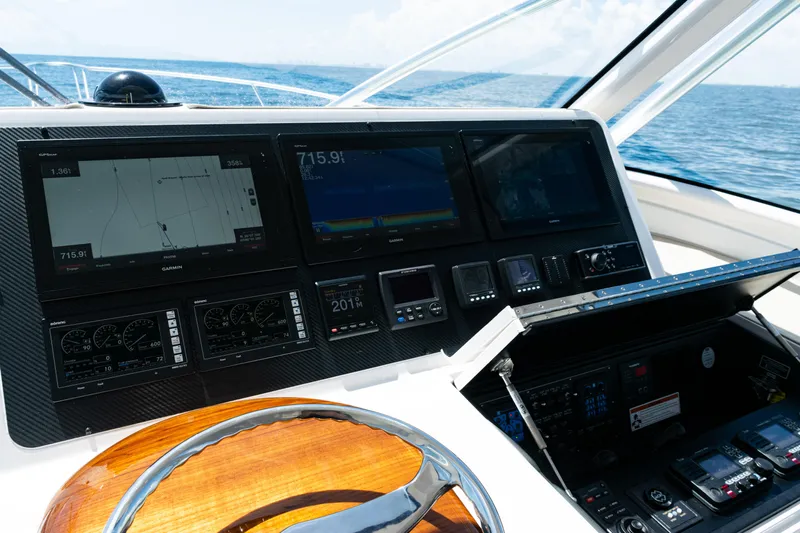  Yacht Photos Pics 2021 Viking 44 Open yacht helm with advanced navigation displays and controls.