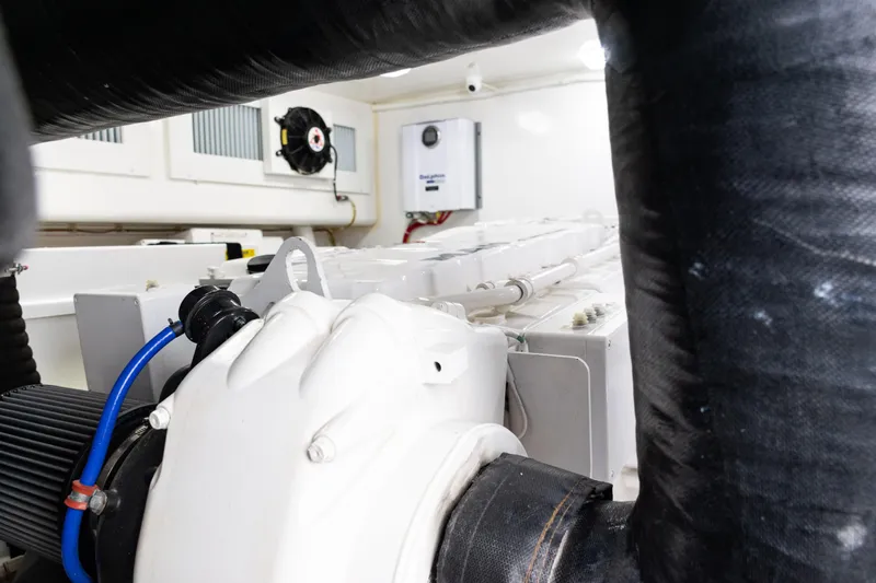  Yacht Photos Pics Engine room of 2021 Viking 44 Open yacht, showcasing mechanical components.