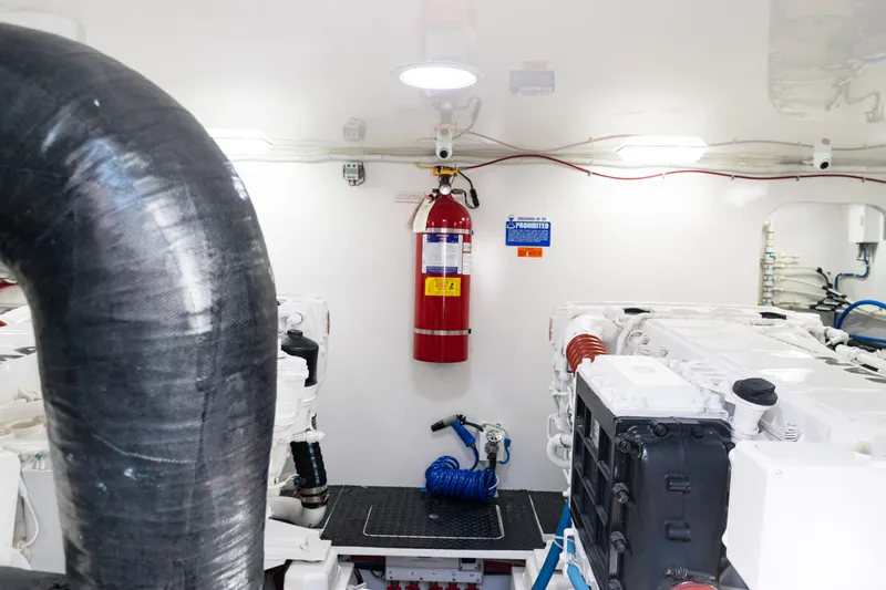  Yacht Photos Pics Engine room of 2021 Viking 44 Open yacht with fire extinguisher and equipment.