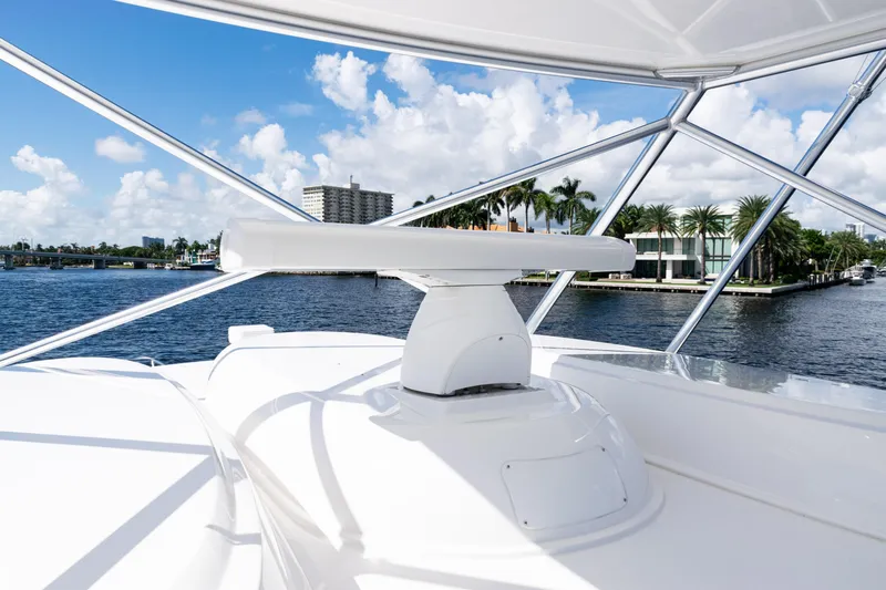  Yacht Photos Pics 2021 Viking 44 Open yacht radar system with waterfront view and palm trees.
