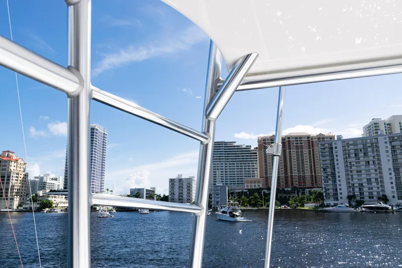  Yacht Photos Pics View from a 2021 Viking 44 Open yacht, overlooking a city skyline and waterfront.