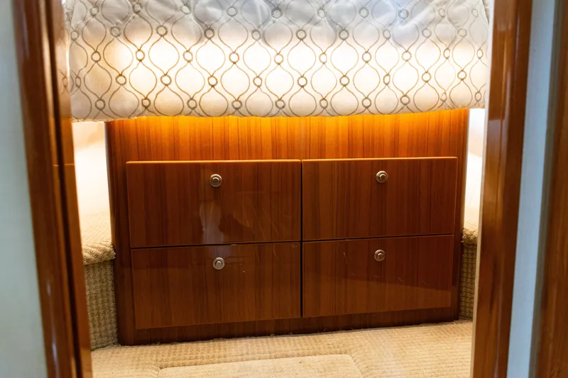  Yacht Photos Pics 2021 Viking 44 Open yacht interior with elegant wood cabinetry and soft lighting.