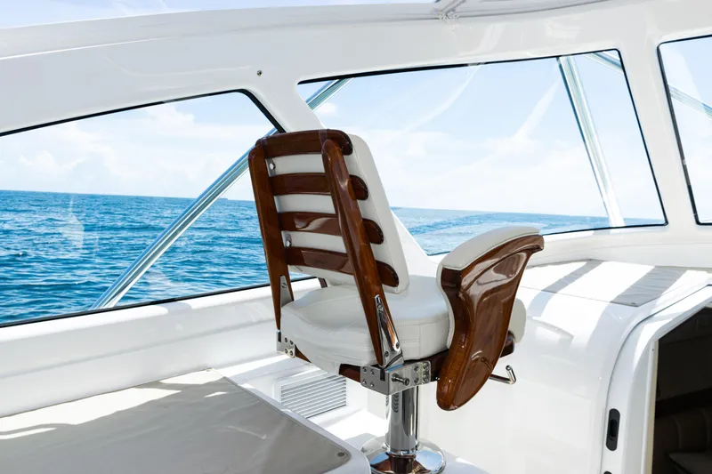 Yacht Photos Pics Captain's chair on 2021 Viking 44 Open yacht, overlooking the ocean.