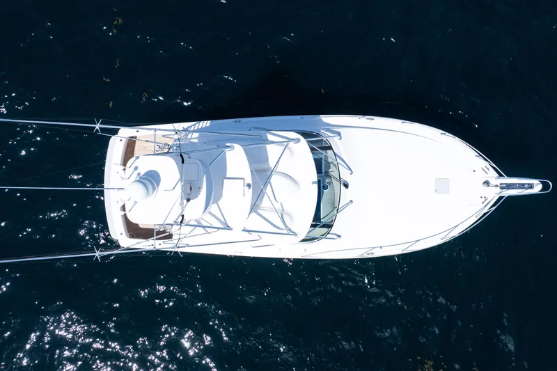  Yacht Photos Pics Aerial view of 2021 Viking 44 Open yacht on dark blue water.