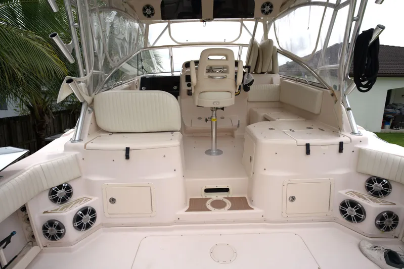  Yacht Photos Pics 2007 Grady-White Express 330 boat interior with seating and helm station.