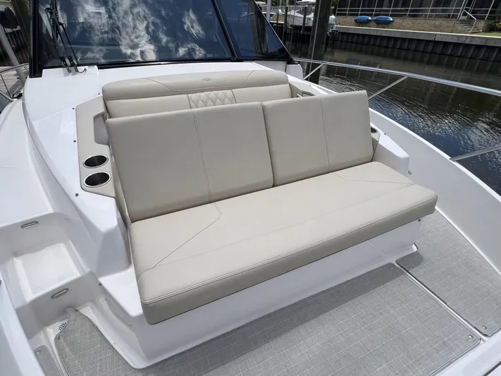  Yacht Photos Pics 2022 Regal 36 XO boat with comfortable seating and cup holders.
