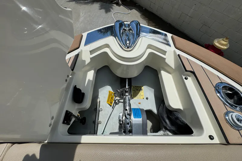  Yacht Photos Pics 2023 Chris-Craft Launch 25 GT boat anchor compartment with polished chrome details.