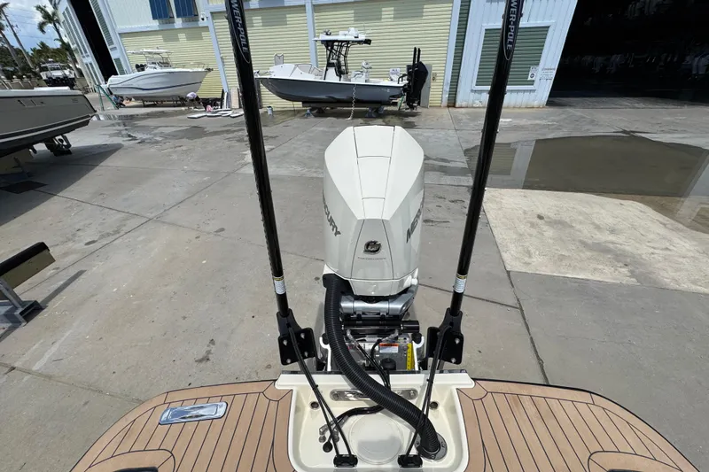  Yacht Photos Pics 2023 Chris-Craft Launch 25 GT with Mercury outboard engine at a marina.