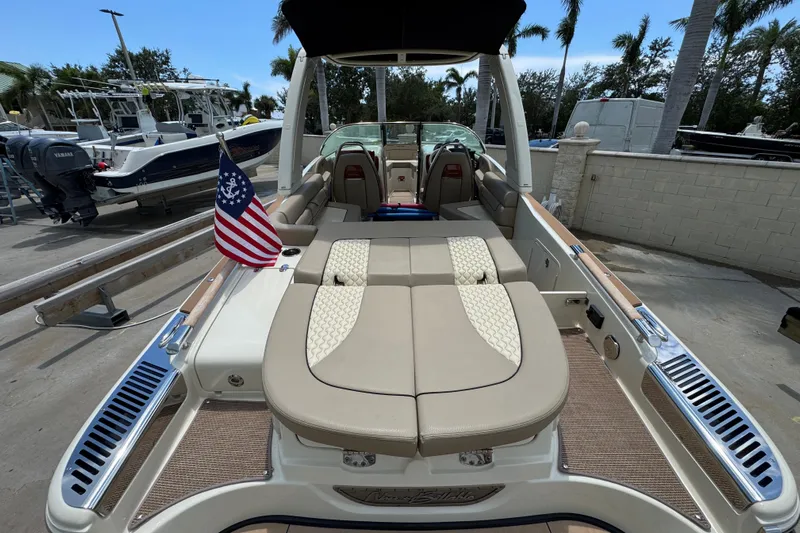  Yacht Photos Pics 2023 Chris-Craft Launch 25 GT boat with elegant seating and American flag.