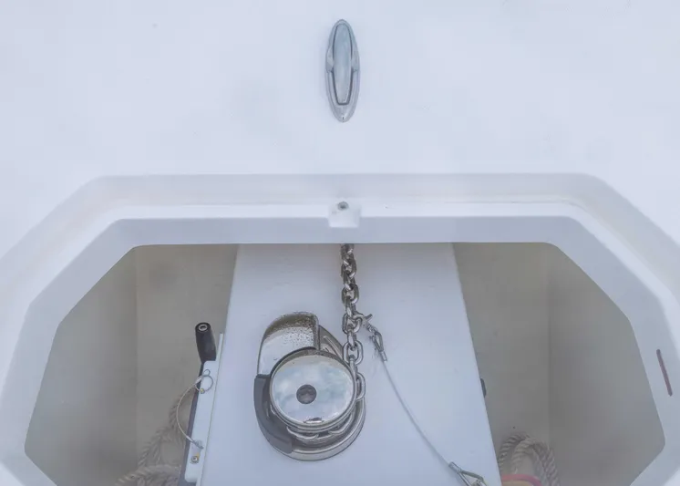  Yacht Photos Pics Anchor compartment of 2023 Invincible 33 Catamaran with chain and winch.