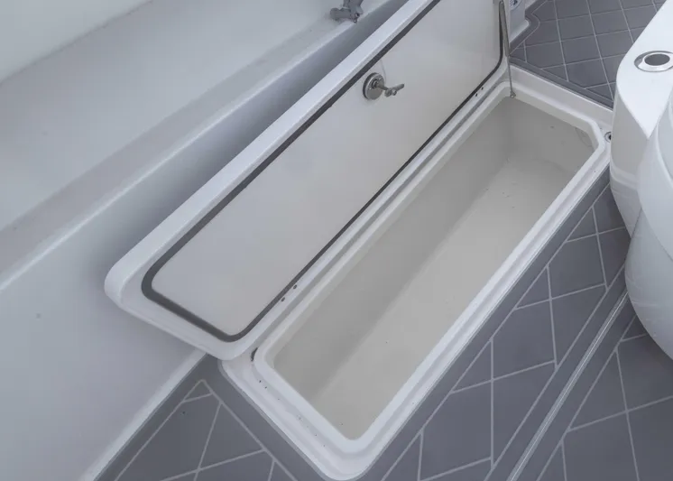  Yacht Photos Pics Open storage compartment on 2023 Invincible 33 Catamaran boat deck.