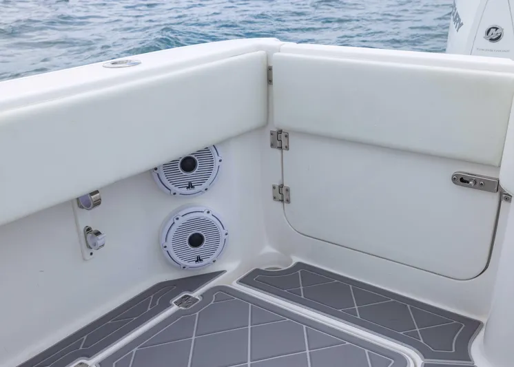  Yacht Photos Pics 2023 Invincible 33 Catamaran interior with speakers and ocean view.