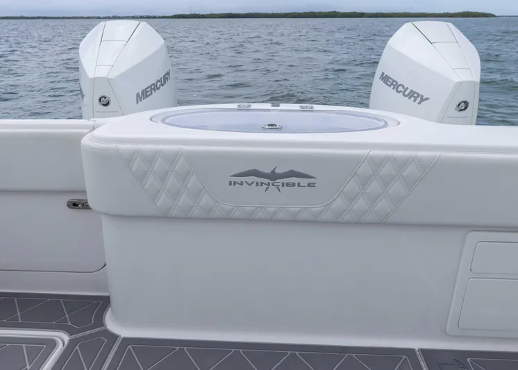  Yacht Photos Pics 2023 Invincible 33 Catamaran with Mercury engines on open water.