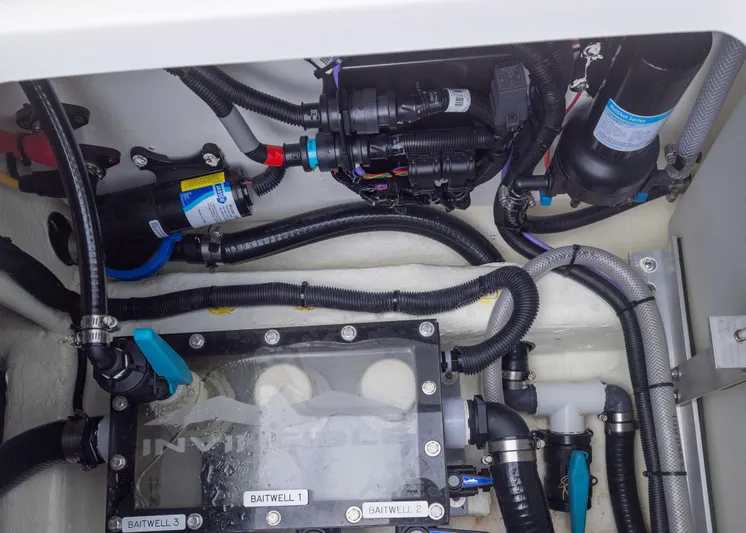  Yacht Photos Pics 2023 Invincible 33 Catamaran engine compartment with wiring and components.