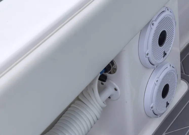  Yacht Photos Pics 2023 Invincible 33 Catamaran speakers and hose detail on deck.