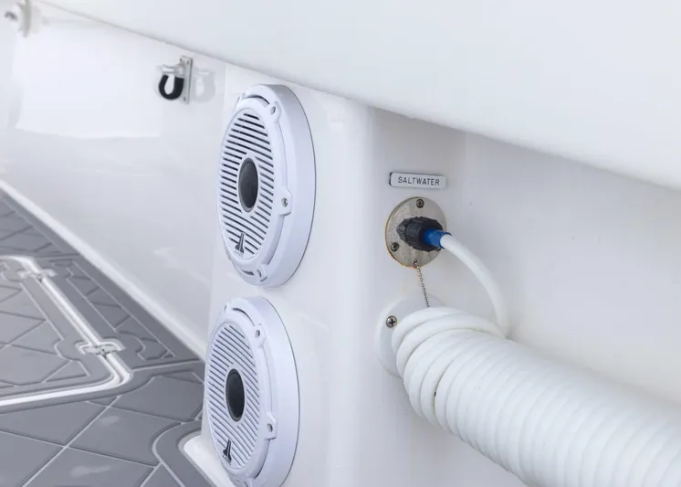  Yacht Photos Pics 2023 Invincible 33 Catamaran interior with speakers and hose connection.