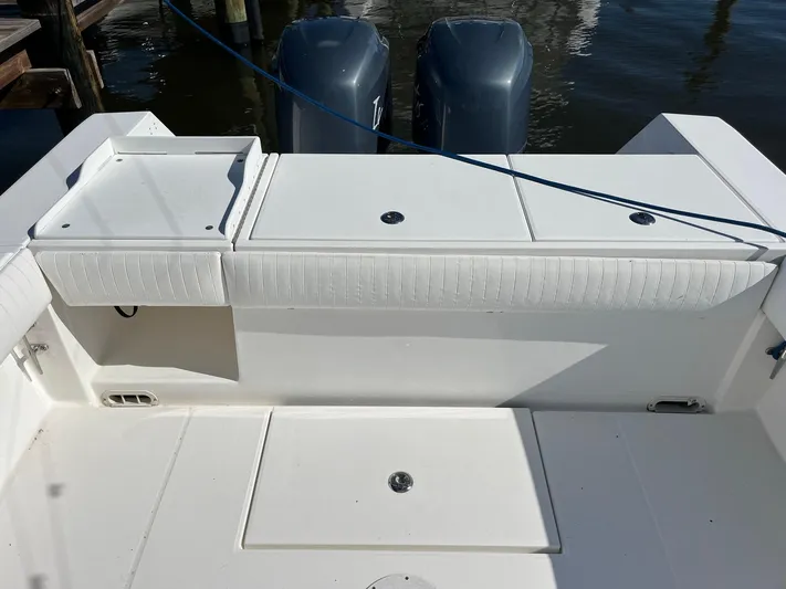 Invictus Yacht Photos Pics 2006 Regulator 32 Center Console with twin outboard engines.