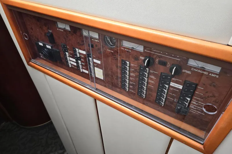  Yacht Photos Pics Control panel of a 1999 Viking Princess 56 yacht, featuring various switches and gauges.