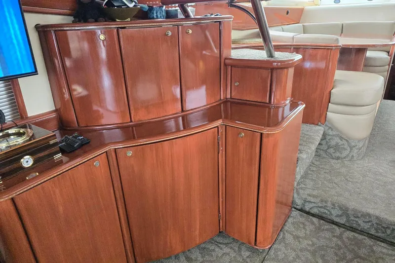  Yacht Photos Pics Luxurious wood cabinetry in 1999 Viking Princess 56 yacht interior.