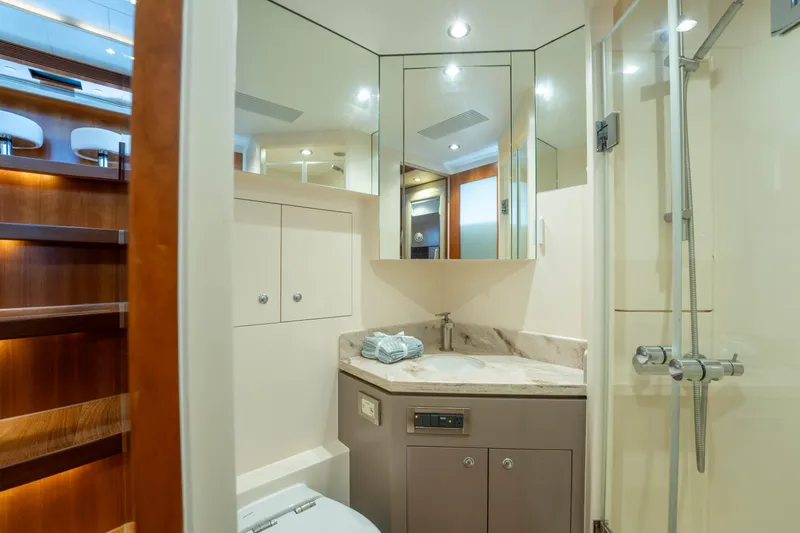 Vitality Yacht Photos Pics Luxurious bathroom in 2016 Horizon PC60 yacht with modern fixtures and elegant design.