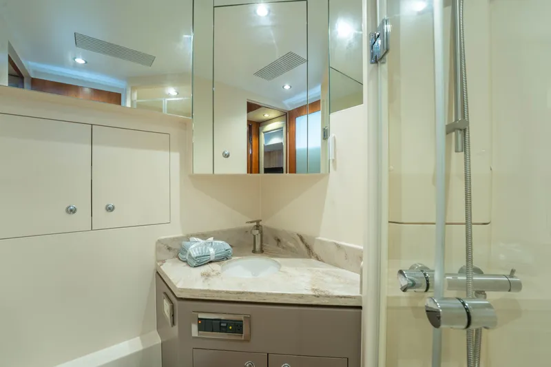 Vitality Yacht Photos Pics Luxurious bathroom in 2016 Horizon PC60 yacht with modern fixtures and elegant design.