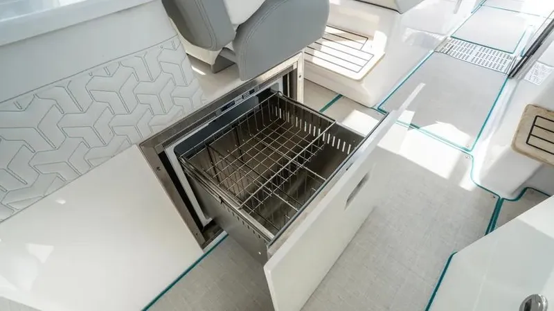  Yacht Photos Pics 2022 Regal LX36 boat interior with open drawer refrigerator.