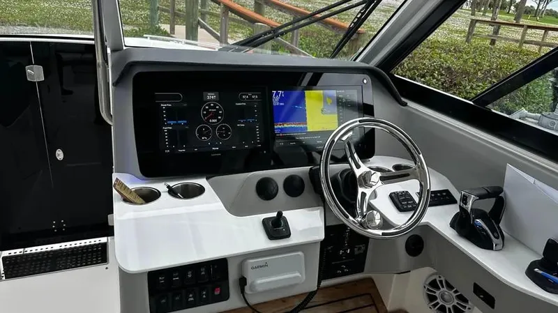  Yacht Photos Pics 2022 Regal LX36 boat dashboard with modern controls and navigation screens.