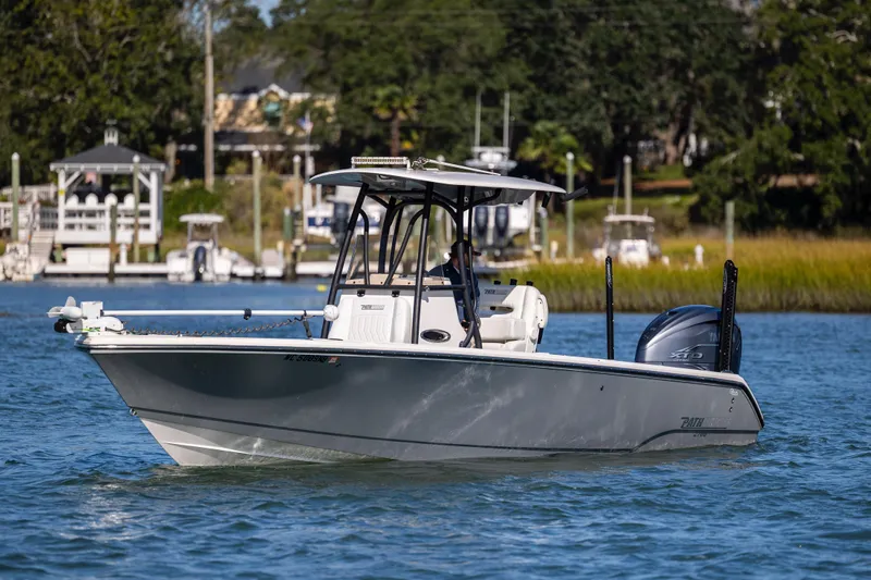  Yacht Photos Pics 2023 Pathfinder 2700 Open boat cruising on a scenic waterway.