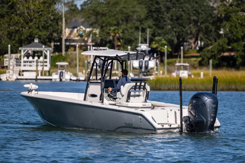  Yacht Photos Pics 2023 Pathfinder 2700 Open boat cruising on a scenic waterway.
