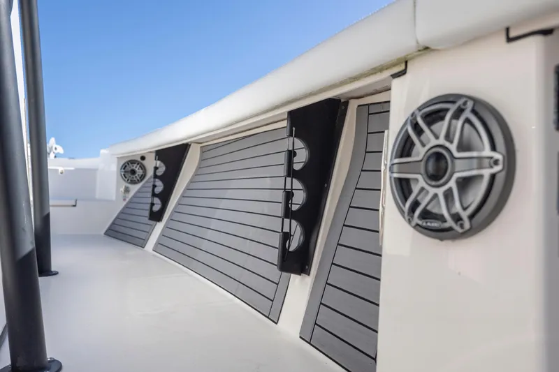  Yacht Photos Pics 2023 Pathfinder 2700 Open boat interior with speakers and sleek design.