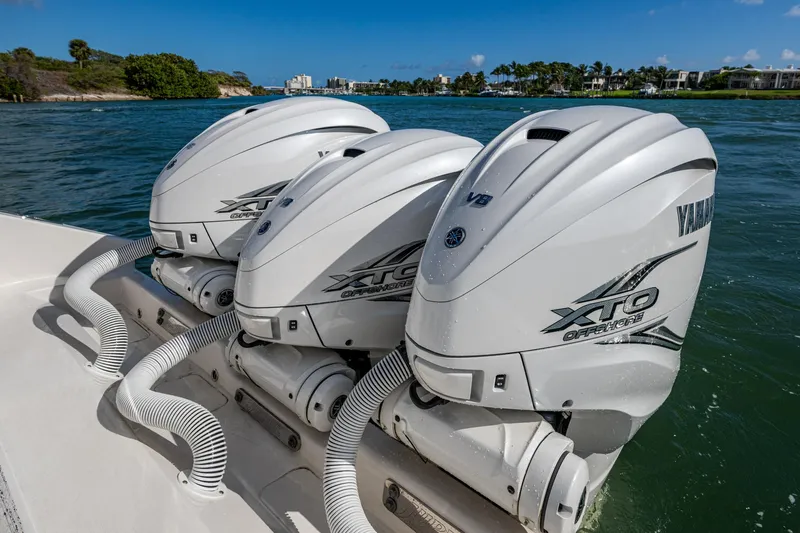 Seas The Day Yacht Photos Pics Triple Yamaha XTO outboard engines on a 2020 Jupiter 43 boat in scenic waters.