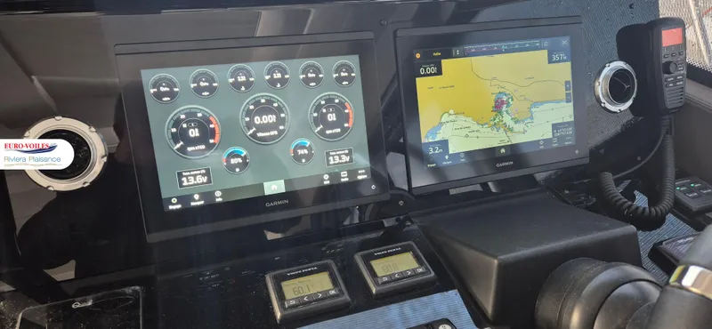 Good Spirit Yacht Photos Pics Dashboard of a 2024 Prestige 460S yacht with navigation and control screens.