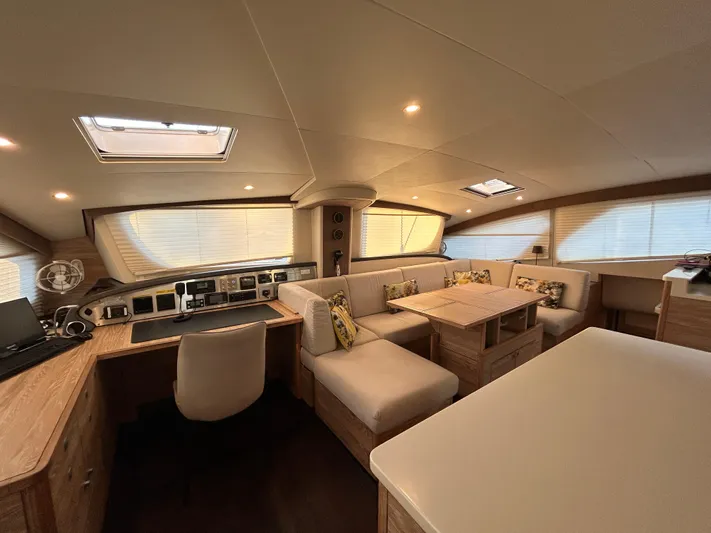  Yacht Photos Pics Luxurious interior of 2019 Xquisite Yachts X5, featuring elegant seating and modern design.