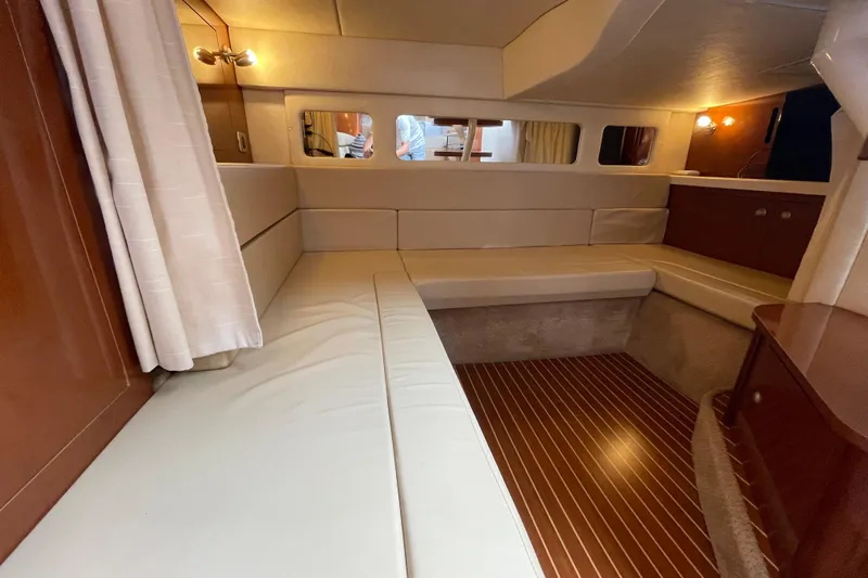 Catalyst Yacht Photos Pics Interior of 2009 Sea Ray 330 Sundancer with beige seating and wood accents.