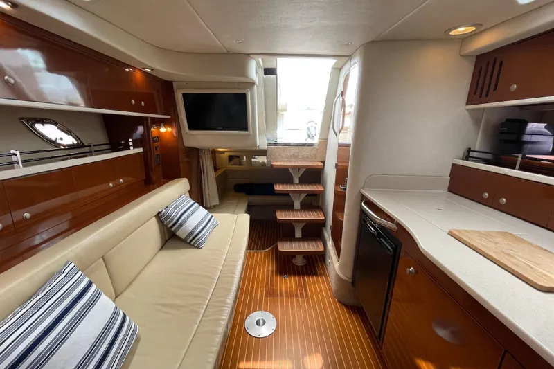 Catalyst Yacht Photos Pics Luxurious interior of 2009 Sea Ray 330 Sundancer yacht with modern amenities and elegant design.