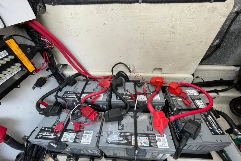 Catalyst Yacht Photos Pics Battery compartment of a 2009 Sea Ray 330 Sundancer with multiple connected batteries.