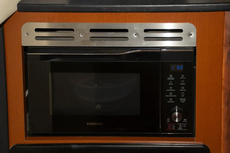 Still Waters Yacht Photos Pics Samsung microwave in 2007 Sea Ray 44 Sedan Bridge yacht kitchen.